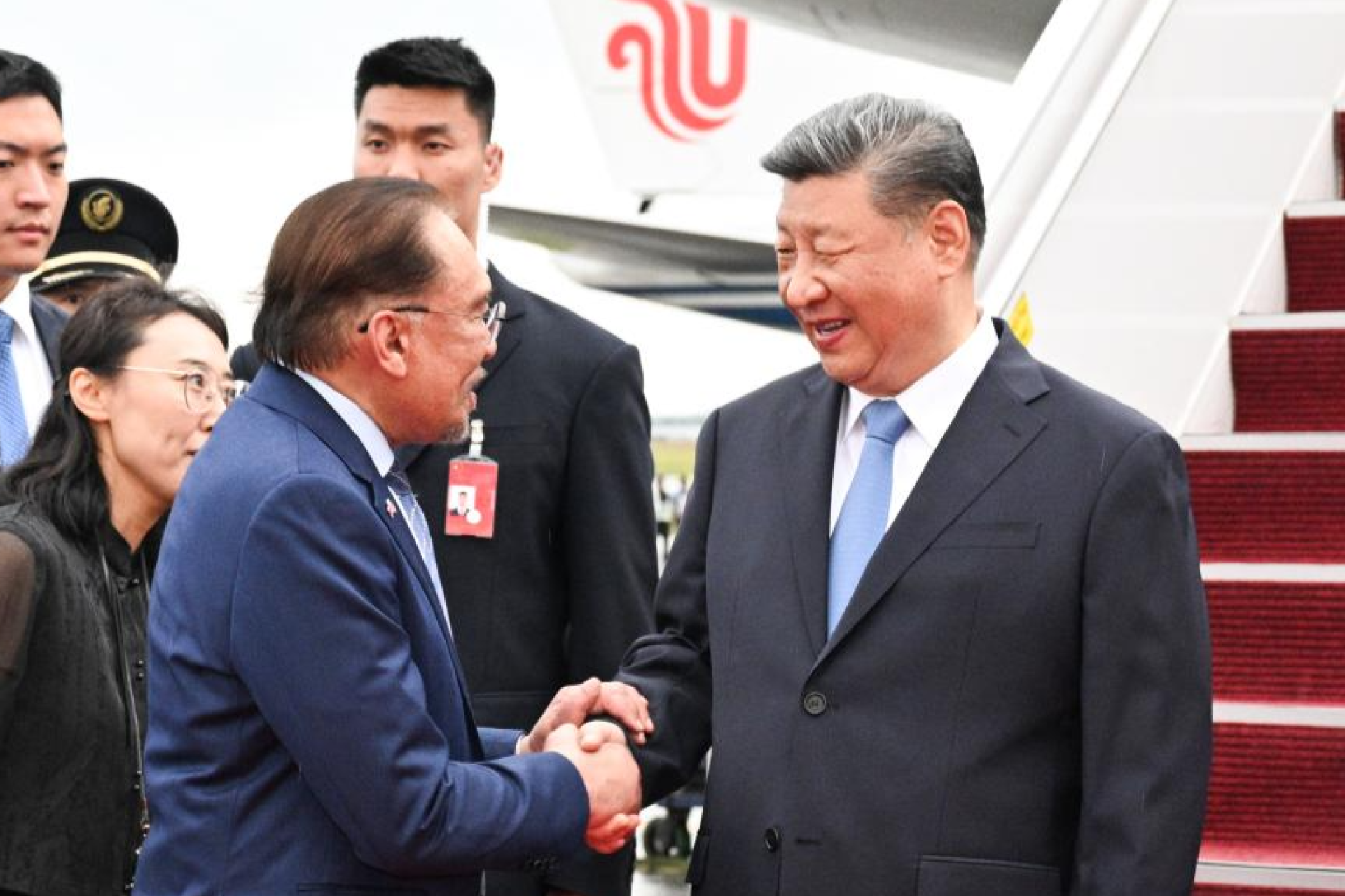 Xi