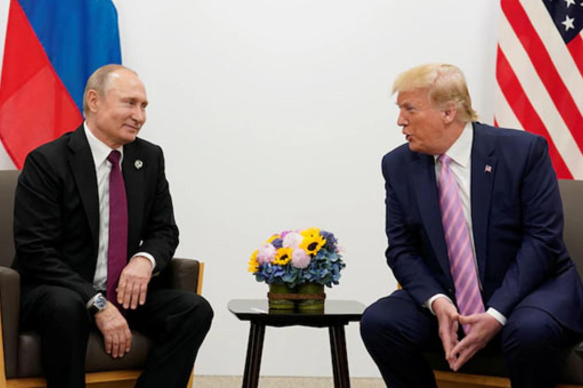 Les présidents russe Vladimir Poutine et américain Donald Trump. Photo d'archives droits tiers