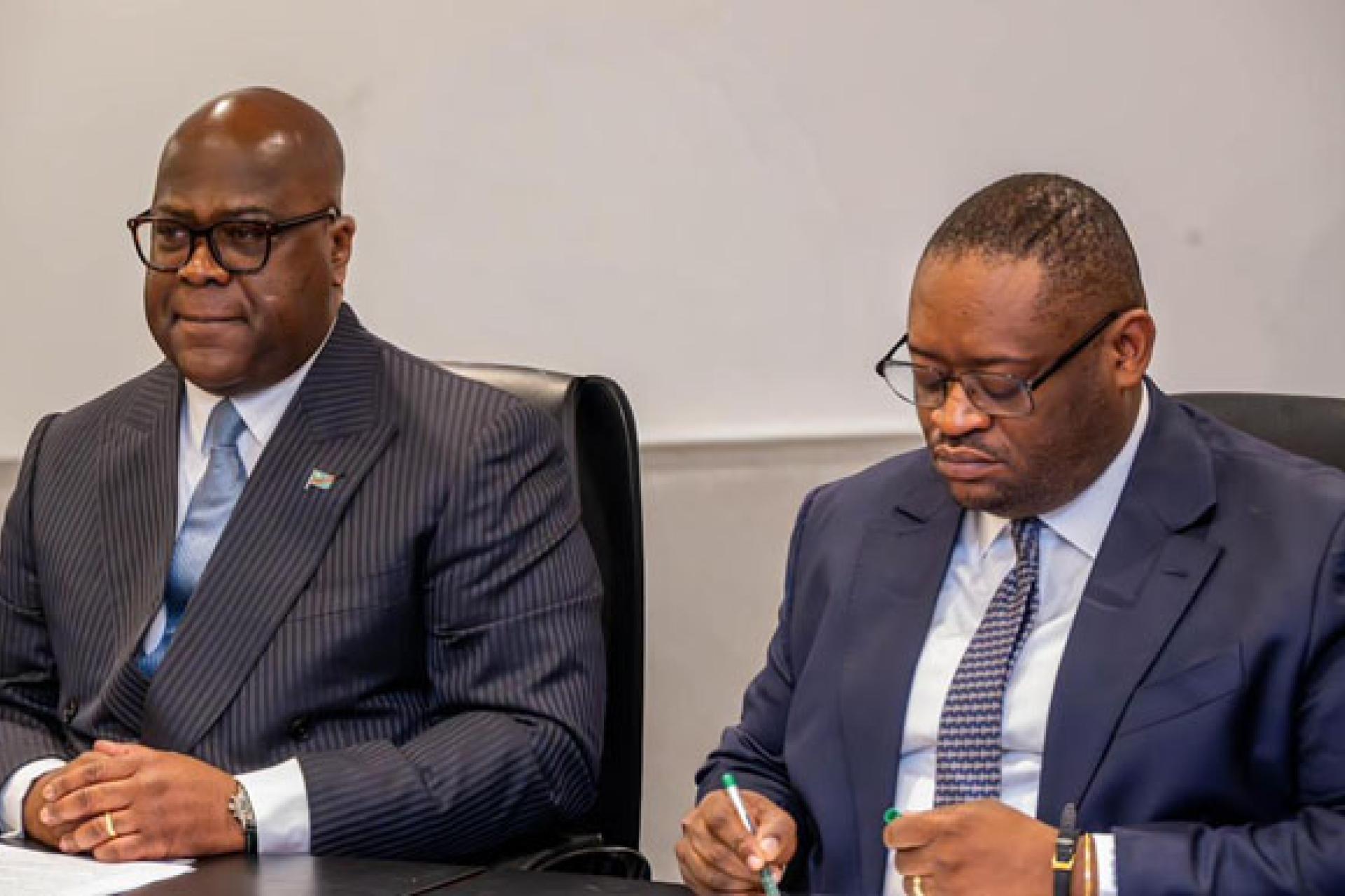 Le Président Félix Tshisekedi et le ministre des Finances, Doudou Fwamba.